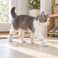 Pink floral pet paw covers in a home entryway